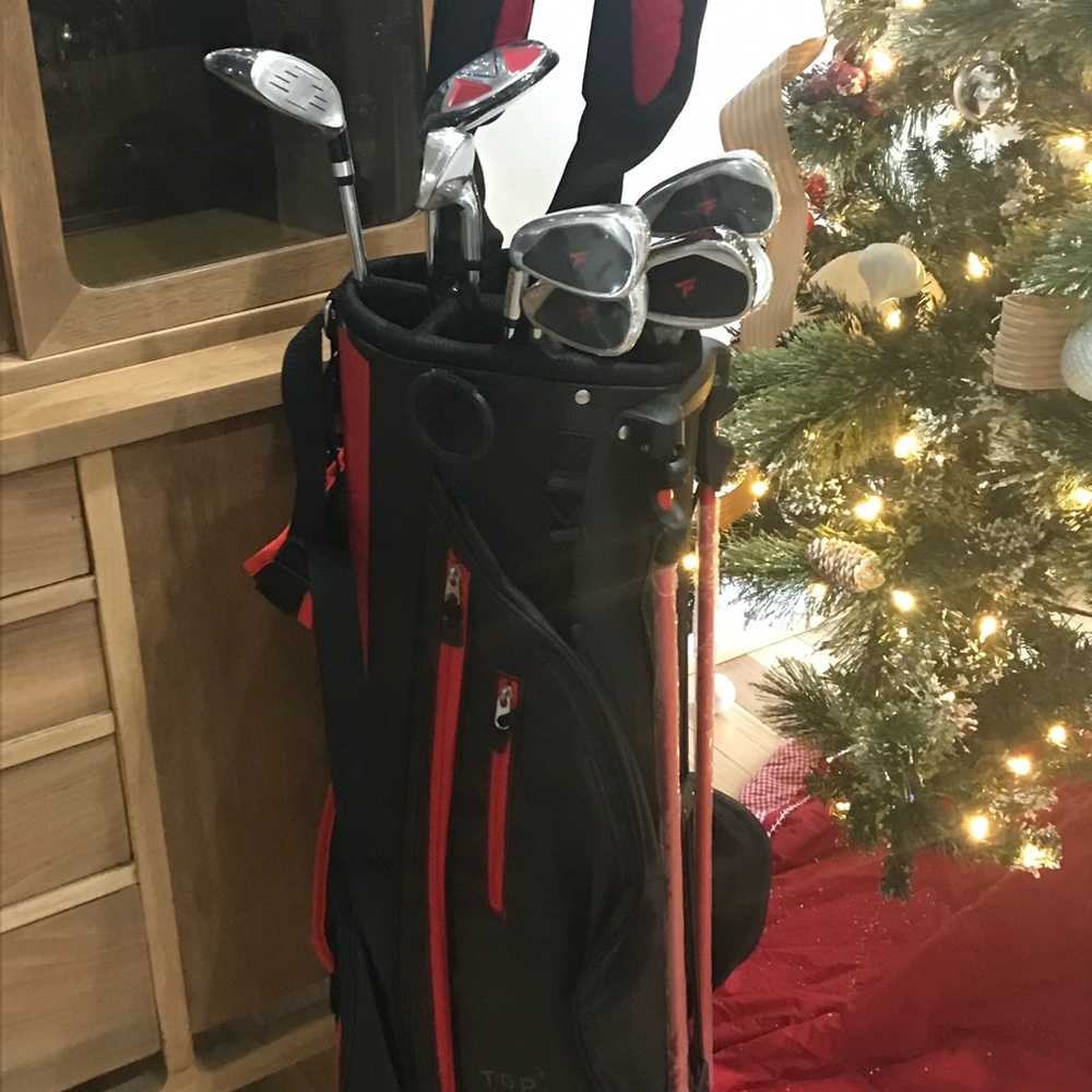 Black and Red Full-Size Golf Bag with Metallic Shafts